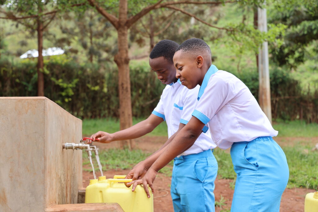 Students from GS Kiburara which is now connected to the Kamushikuzi II water supply system.