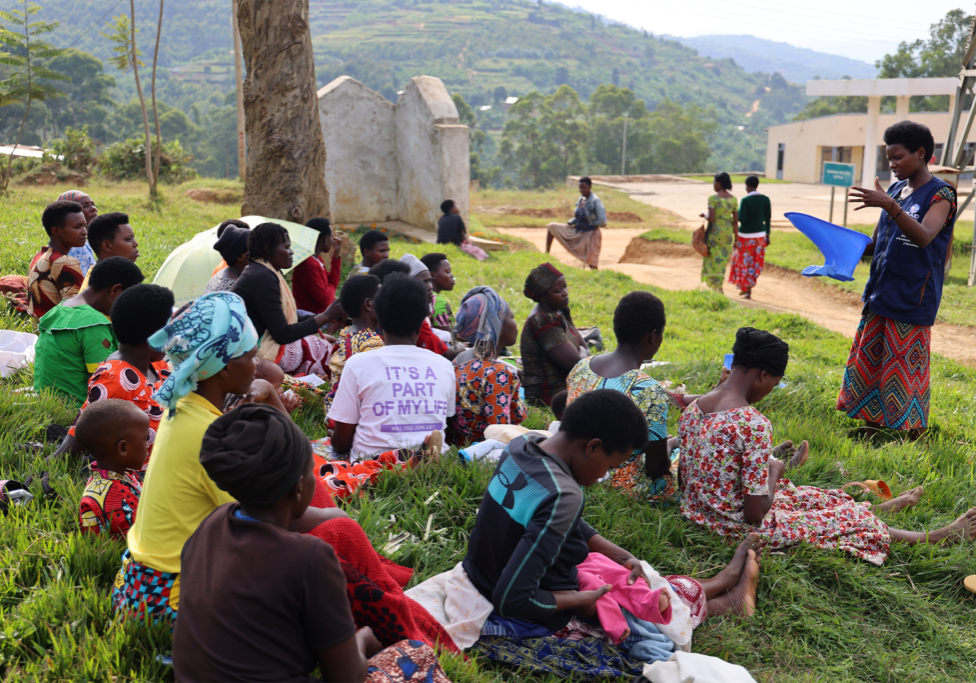Francoise Tuyizere during one of her community outreach - selling SATO Pans